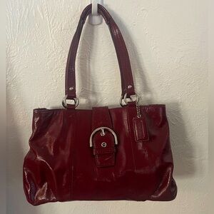 burgundy coach bag